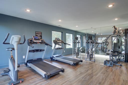 Fitness center with treadmills and weights at Mirador at Idlewood in Clarkston near Tyrone and East Atlanta