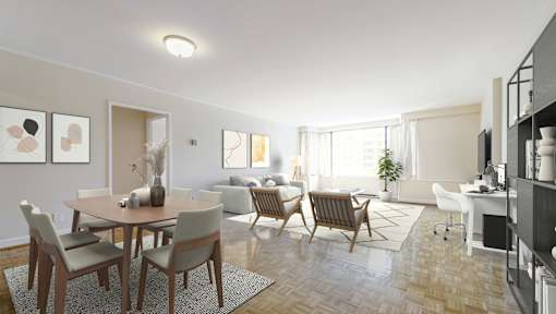 A dining room with a table set for six and chairs around it.