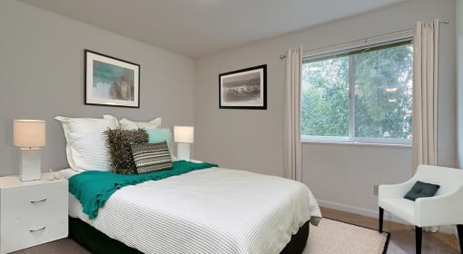 One Bedroom Apartments in Coeur D'Alene ID - Trail Lodge - Bedroom with Plush Carpeting and  Large Window