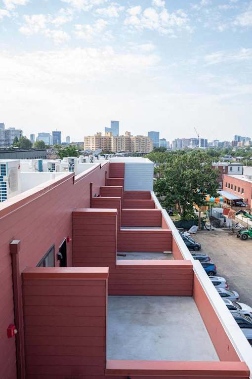 a view of the city from the roof of a building