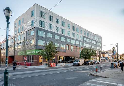 a building on the corner of a city street
