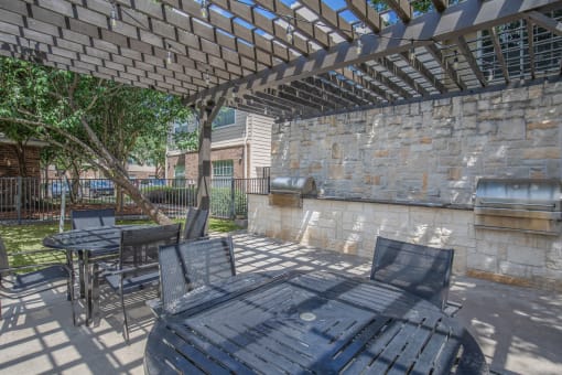 Pet-Friendly Apartments in Houston, TX – Westchase Forest – Photo of BBQ Grill and Picnic Tables