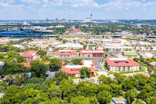 A bird's eye view of a city with buildings and trees.