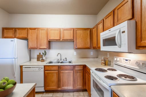 Clarksville, TN Apartments - Parc at Clarksville - Open concept kitchen with cabinet and storage space