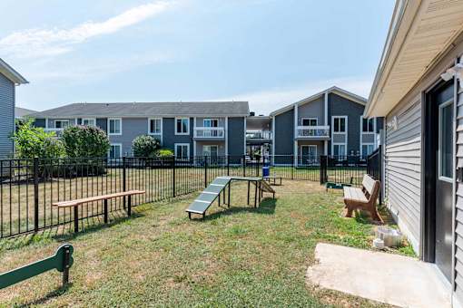 A sunny day at a residential complex with a playground.