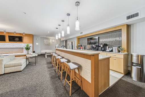 Community kitchen and serving counter inside River 595 Apartments in Des Plaines