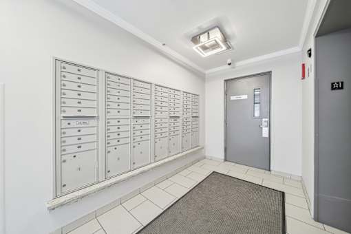 Secure package and mailroom for residents at River 595 Apartments