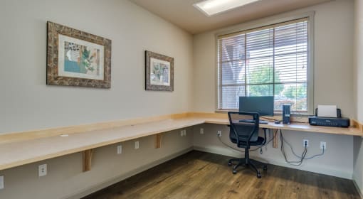 Apartments in Coeur d’Alene ID - Rockwood Lodge - Business Center with Desk Space, a Computer, and a Printer