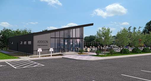 A modern building with the name "Addison" on it.