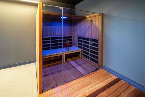 3thirty3 new rochelle ny apartment high rise photo of infrared sauna with teak wood and glass doors next to fitness center