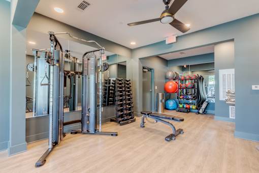 Wellness and fitness center with cardio and strength training equipment at Sage 5430 apartments near Historic Downtown Norcross.