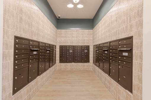 Mail room in a senior living community in Norcross with organized mailboxes for residents.