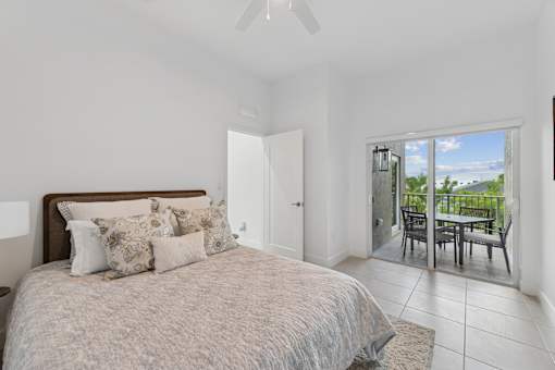 large bedroom with balcony access in pet friendly home for rent Pompano Beach