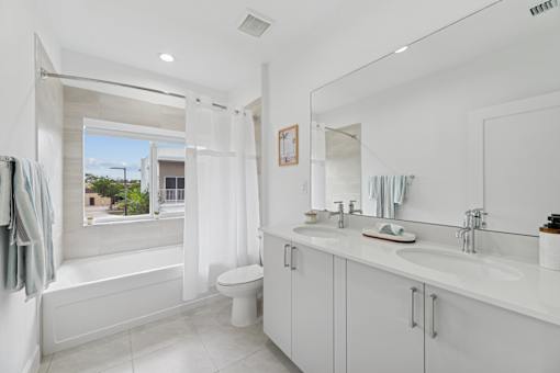 bathroom with double vanity in modern townhome for rent in Pompano Beach FL
