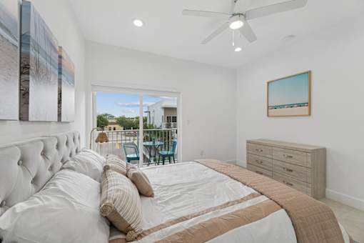 primary bedroom with natural light in luxury home for rent Pompano Beach Florida