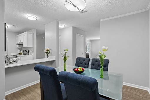 Dedicated dining area inside a one, two and three bedroom apartment home at Southwinds Point Apartments in Stockbridge, GA.