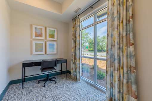Resident office space with large windows and natural light at Springview Apartments in Decatur near I-20.