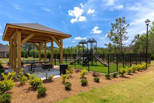 Outdoor pavilion and landscaped gathering area at Springview Apartments, a pet-friendly apartment community in Decatur, GA.