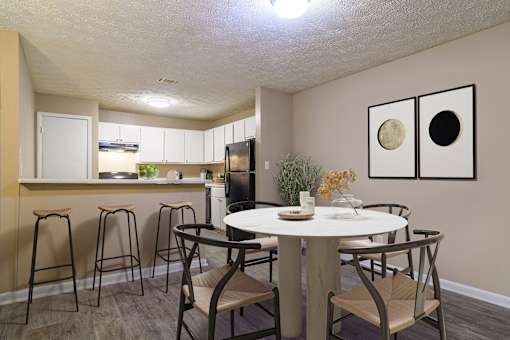Spacious dining room at Stratford Ridge Apartments near Smyrna, GA, designed for comfortable meals and entertaining with plenty of natural light.