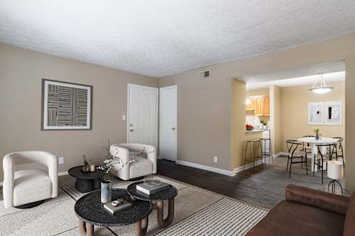 Spacious living room with natural light and comfortable seating in a pet-friendly home at Stratford Ridge Apartments in Marietta, GA.