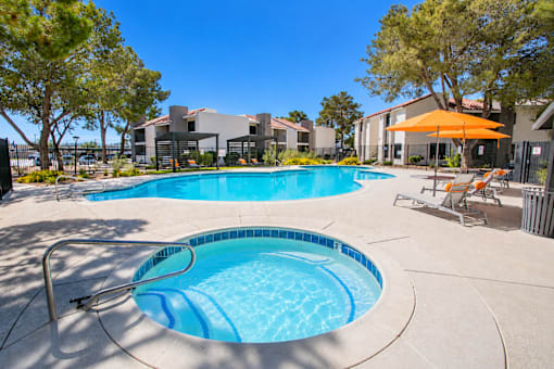 Swimming pool and spa with outdoor lounge areas at Haven at Lone Mountain in Las Vegas, NV