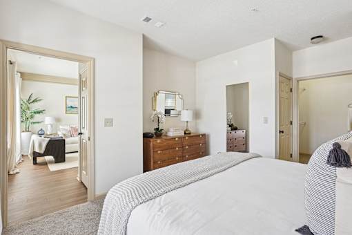 Spacious bedroom with natural light and neutral decor in Tattersall Village Apartments, Hinesville, GA