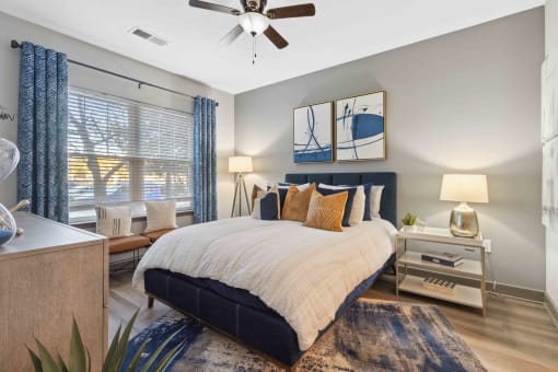 Sage at 1240 apartments in Mount Pleasant South Carolina photo of bedroom with hardwood flooring and ceiling fan