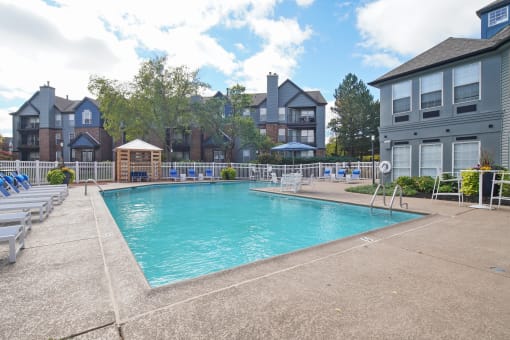 Apartments in Glendale Heights for rent - The Mark -  our apartments offer a swimming pool and large sundeck with lounge chairs