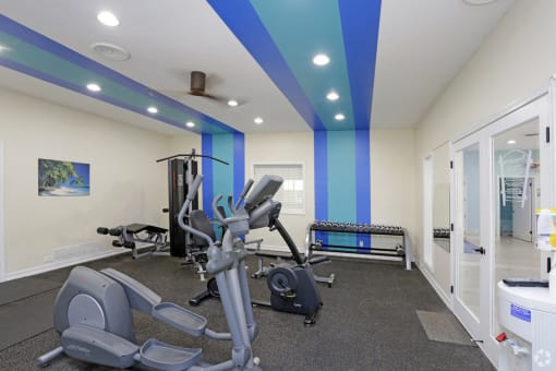 Apartments in Carlsbad CA - The Village Apartments Fully Equipped Fitness Center with Ceiling Fan, Elliptical, and Much More