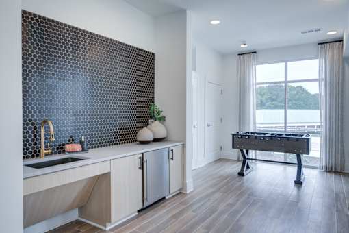 Resident coffee bar and gathering space at Townes at Clarkston Centre apartments in Clarkston, GA.