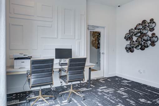 Resident business center with workspace at Townes at Clarkston Centre apartments near Decatur.