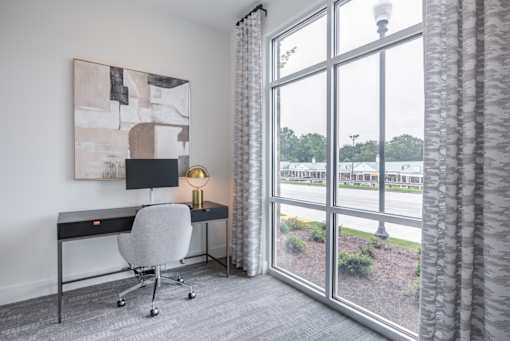 Resident business center with workspace at Townes at Clarkston Centre apartments near Decatur
