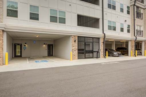 Resident parking garage at Townes at Clarkston Centre apartments in Clarkston, GA.