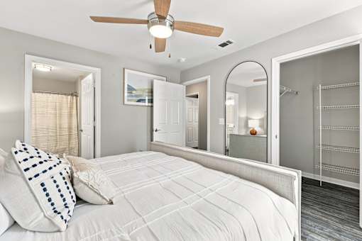 Bedroom with adjoining bathroom and spacious closet in a West Hattiesburg apartment