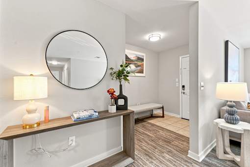Welcoming apartment entryway opening into the living area at Twin Oaks near Oak Grove