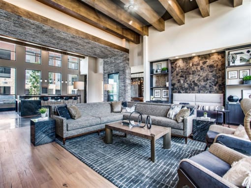 a large living room with couches and a coffee table