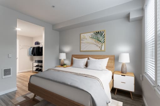 a bedroom with a large bed and a closet in a 555 waverly unit