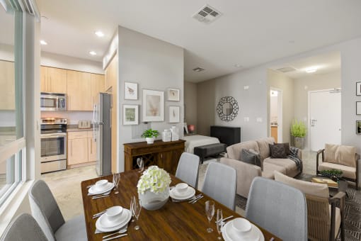 A modern dining room with a wooden table set for six.