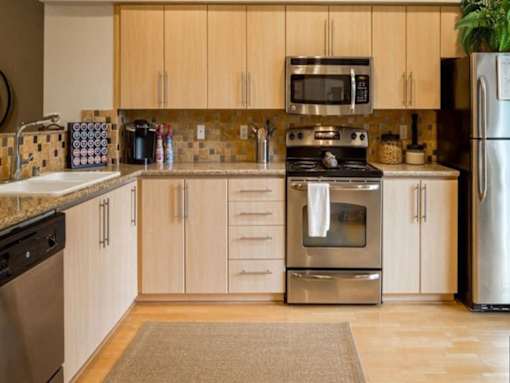 updated kitchen with stainless steel appliances