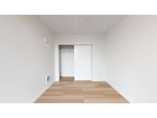 Bedroom with sliding closet door