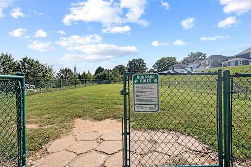 Pet-friendly dog park signage at Hawks Landing Apartments in Hickory, NC