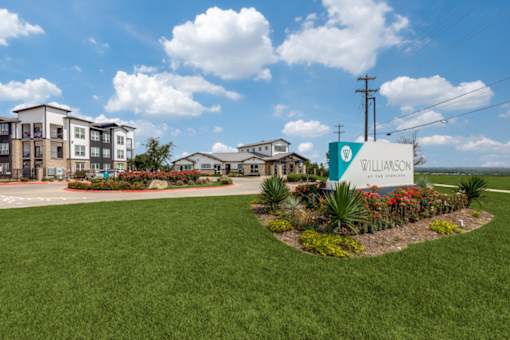 Entrance sign at Williamson at the Overlook apartments in Georgetown TX near Austin