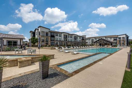 Resort-style pool deck at apartments in North Georgetown TX near I-35 corridor