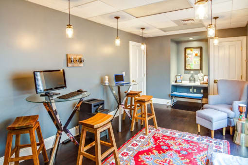 business center with computers and lounge area
