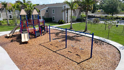 playground and green space at Woodlake Villas pet-friendly Orlando apartments