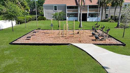 outdoor fitness area at Woodlake Villas apartments in Orlando, FL