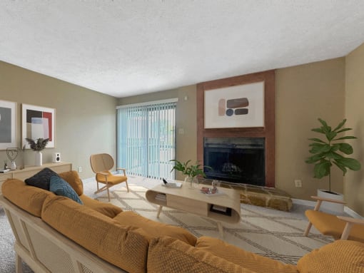 a living room with a couch and a fireplace
