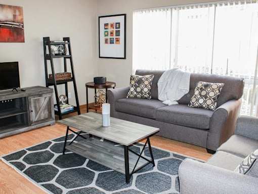 living room in The Gates of Rochester Apartments