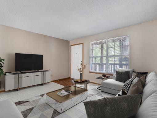 a living room with a couch and a coffee table