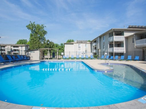 swimming pool with sundeck at Forest Park apartments